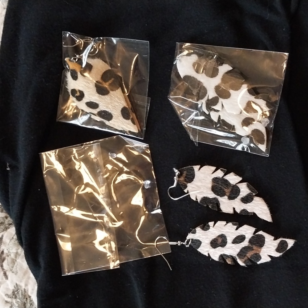 3 pair of felt animal print earrings. New.